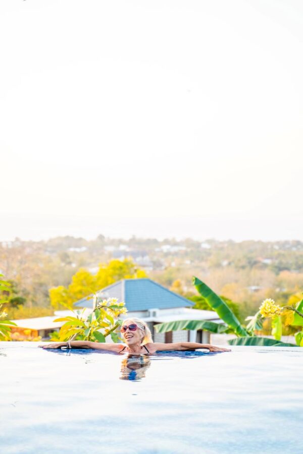 Sunset pool view with model